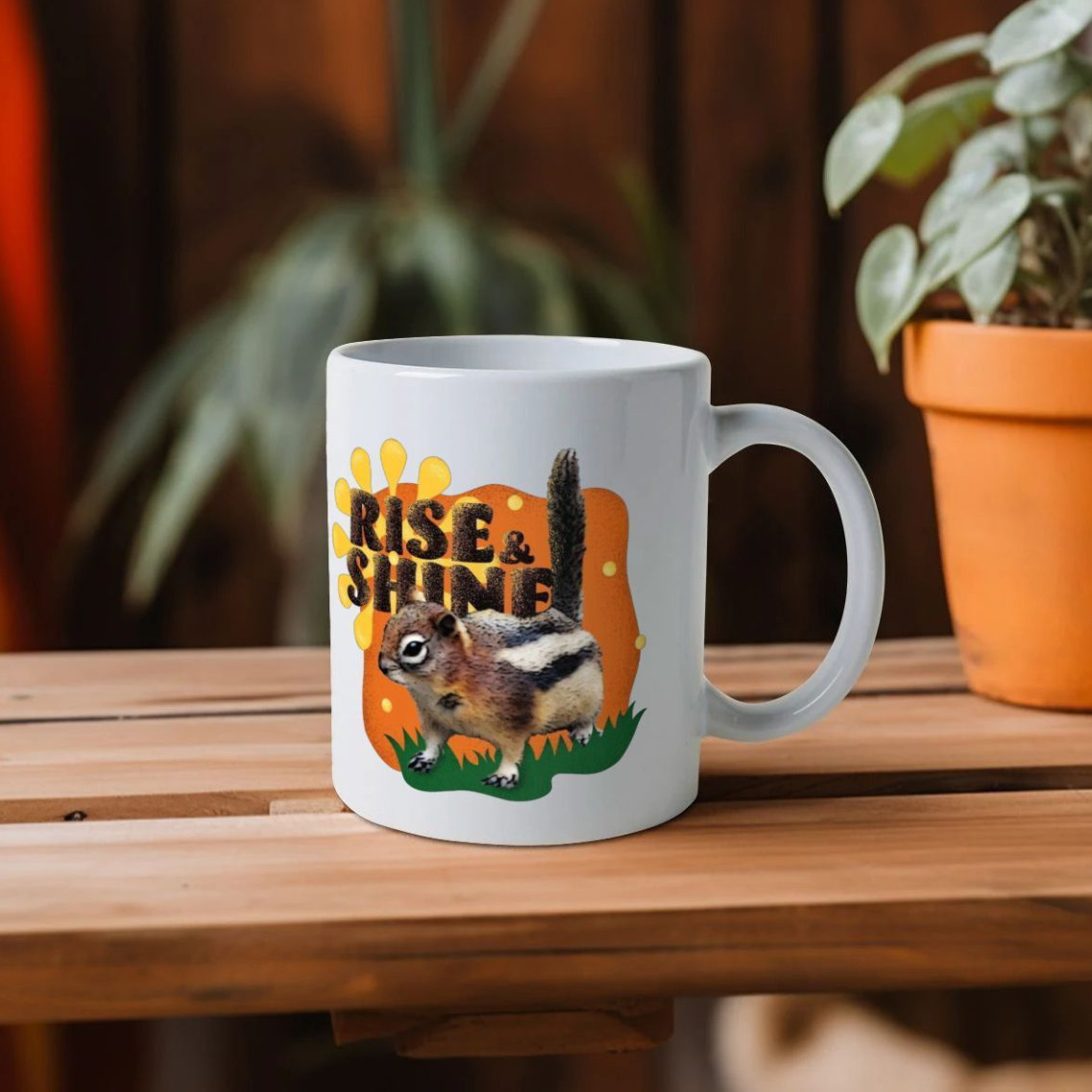 ceramic mug on shelf with a rise and shine squirrel motif by lumimango