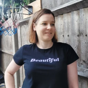 white women wearing black Remill t-shirt with lilac beautiful logo